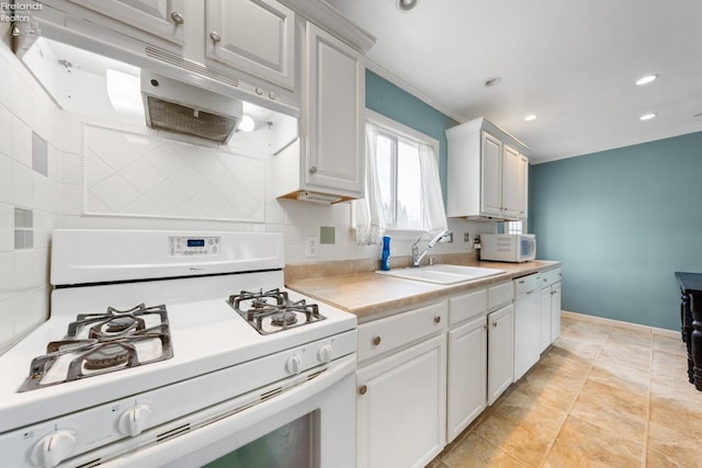 kitchen with white cabinetry, white appliances, sink, and ornamental molding