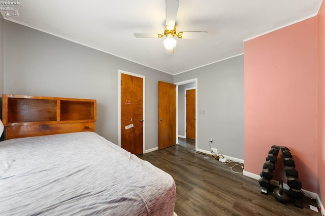 bedroom with ceiling fan and dark wood-type flooring