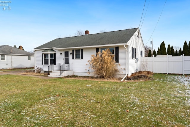 view of front of property with a front lawn