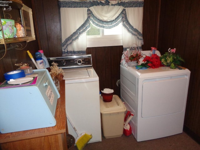 laundry area with washing machine and dryer