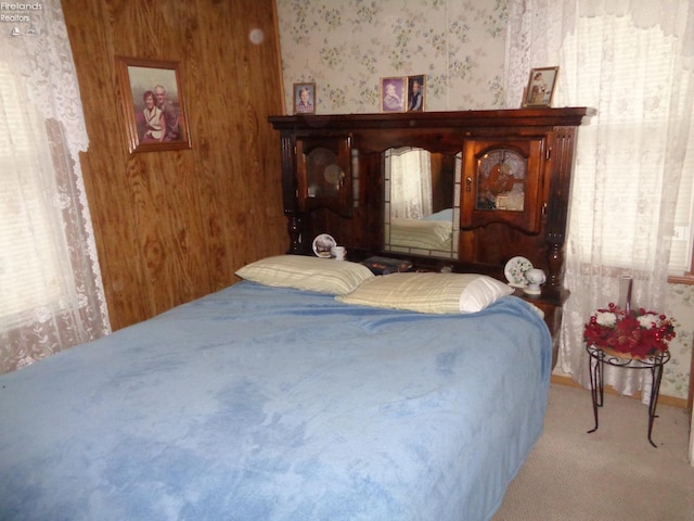 bedroom featuring carpet