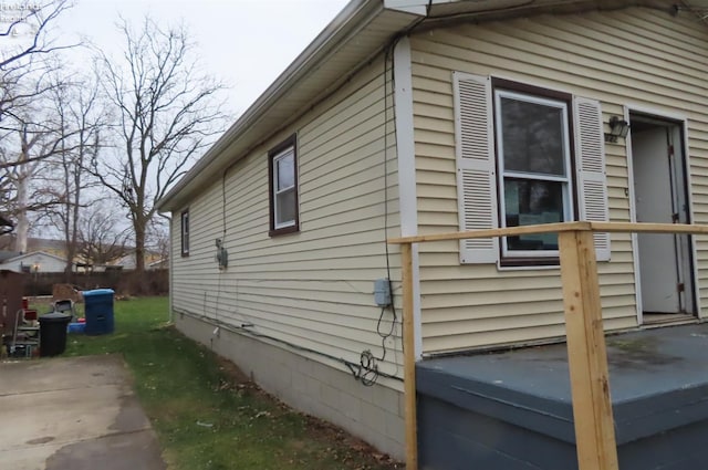 view of home's exterior featuring a jacuzzi