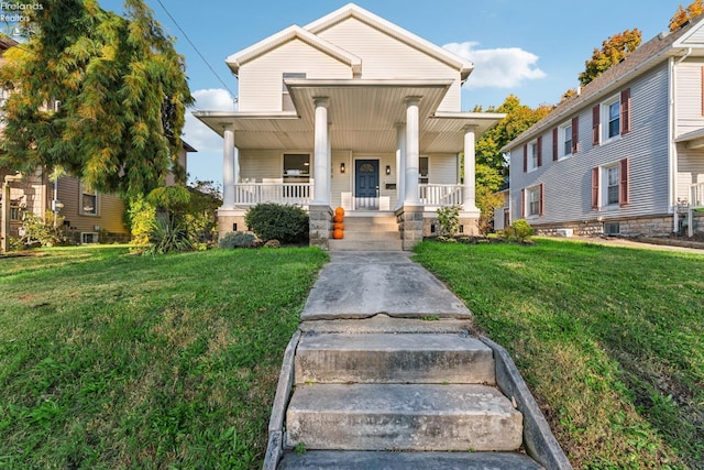 view of front of property with a front lawn and a porch