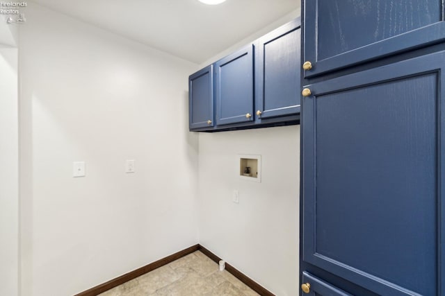 laundry room featuring cabinets and washer hookup