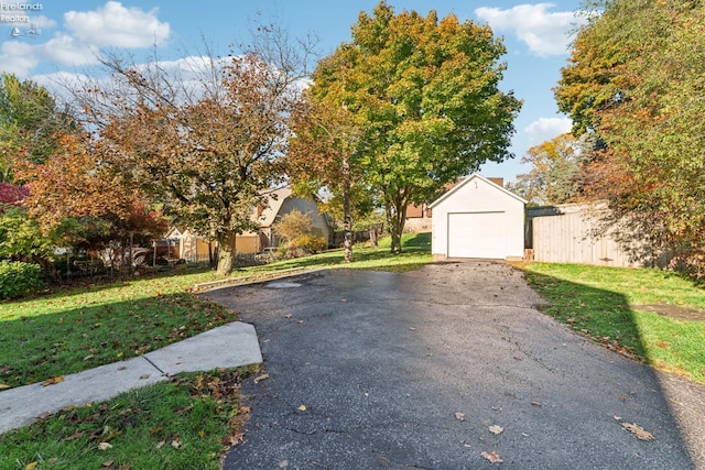 exterior space featuring an outdoor structure and a garage