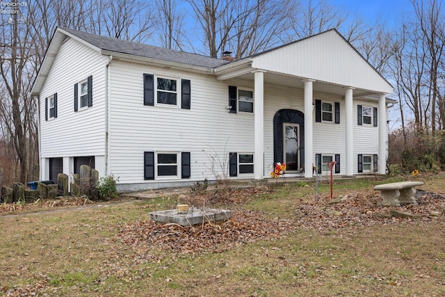 split foyer home featuring covered porch