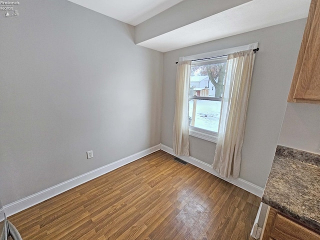 interior space with hardwood / wood-style flooring