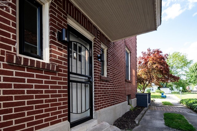 view of property exterior featuring covered porch