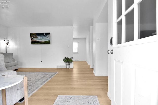 living room featuring light wood-type flooring