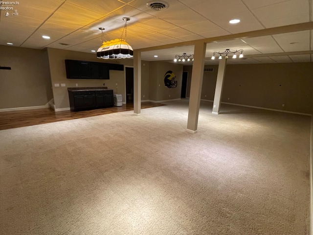 basement featuring carpet floors