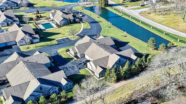 drone / aerial view featuring a water view