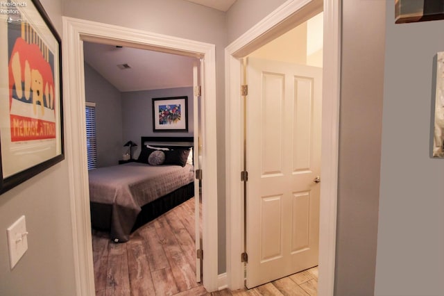 hall with light hardwood / wood-style flooring