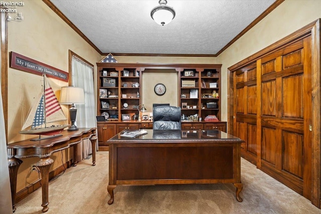 office space with light colored carpet, a textured ceiling, and ornamental molding