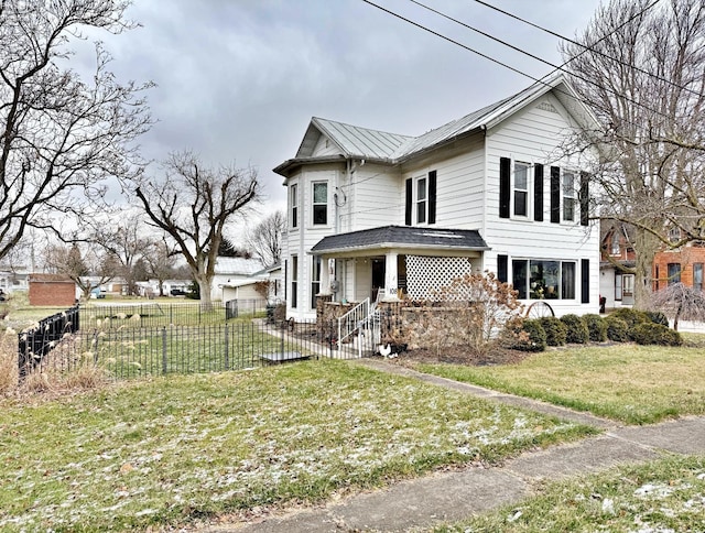 view of front facade featuring a porch and a front lawn