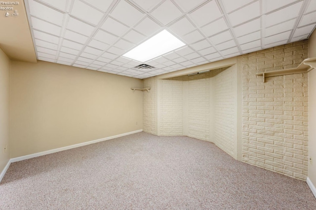 basement featuring carpet flooring