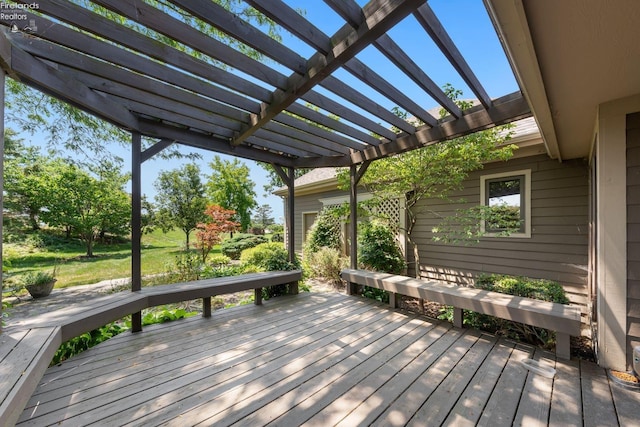 wooden terrace featuring a pergola