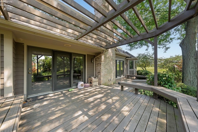 wooden terrace with a pergola