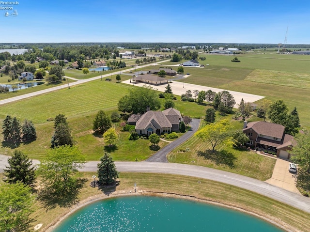 aerial view featuring a rural view and a water view