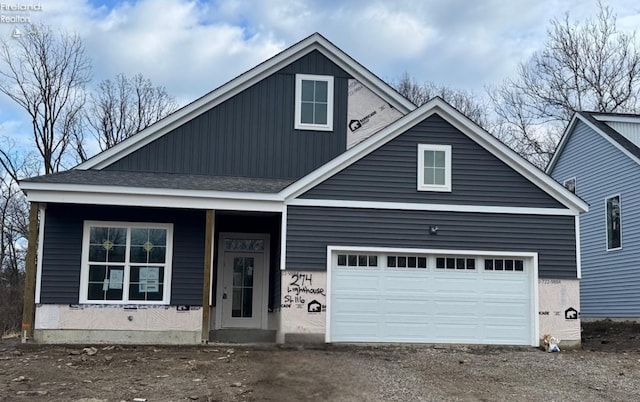 view of front of house with a garage and board and batten siding