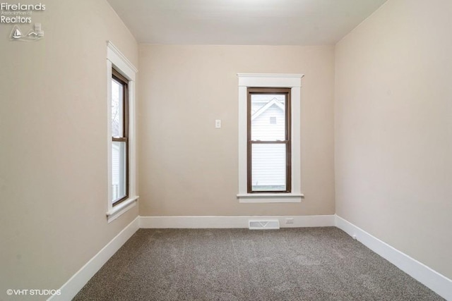 view of carpeted spare room