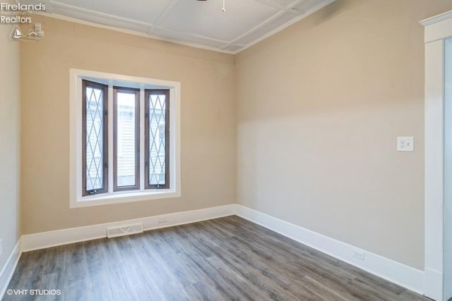 empty room with dark hardwood / wood-style floors and ceiling fan