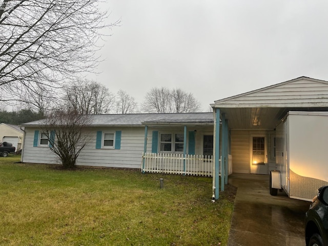 single story home with covered porch and a front lawn