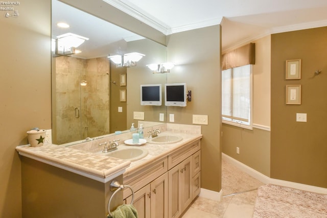 bathroom with tile patterned flooring, vanity, an enclosed shower, and crown molding