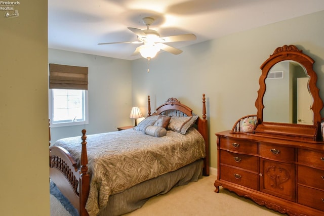 carpeted bedroom with ceiling fan