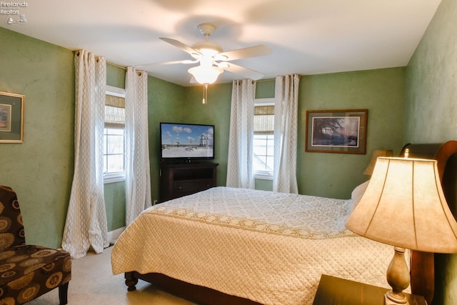 bedroom featuring carpet flooring and ceiling fan