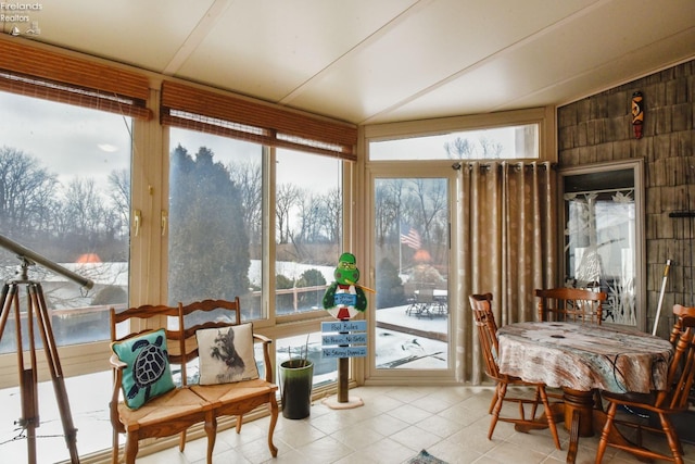 sunroom / solarium featuring a healthy amount of sunlight