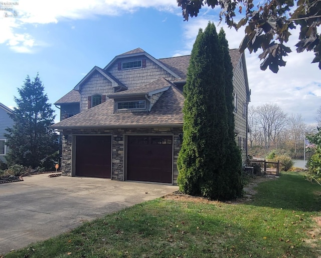 view of side of property with a lawn