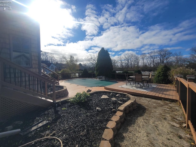 view of pool featuring a deck