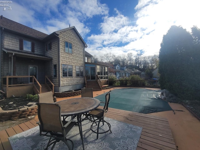 view of pool featuring a wooden deck