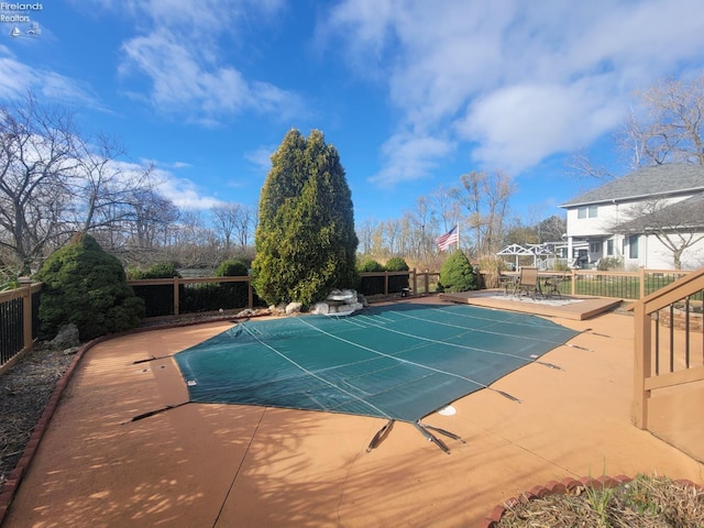 view of pool with a patio area