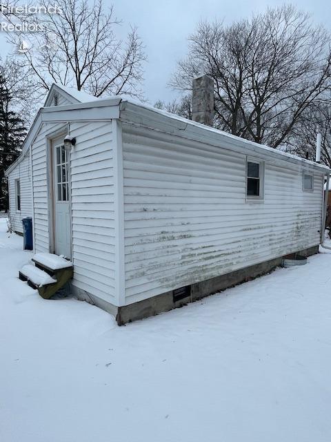 view of snow covered structure