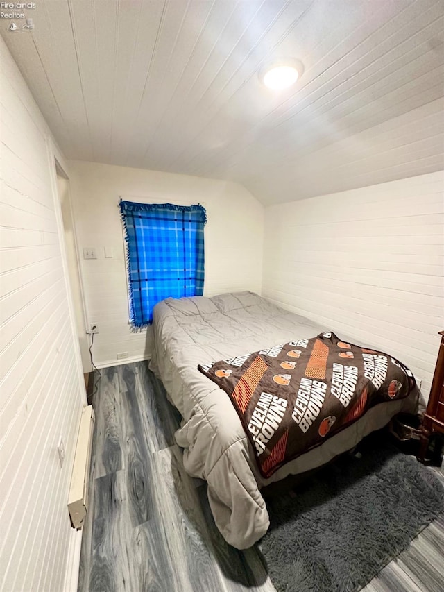 bedroom with wood-type flooring