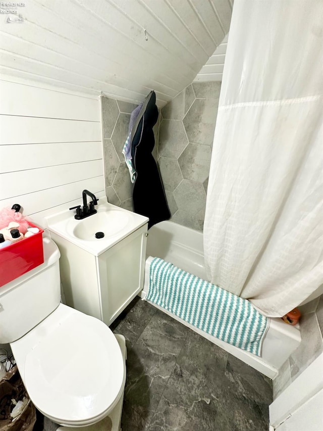 bathroom with vaulted ceiling, wooden walls, shower / tub combo with curtain, vanity, and wood ceiling