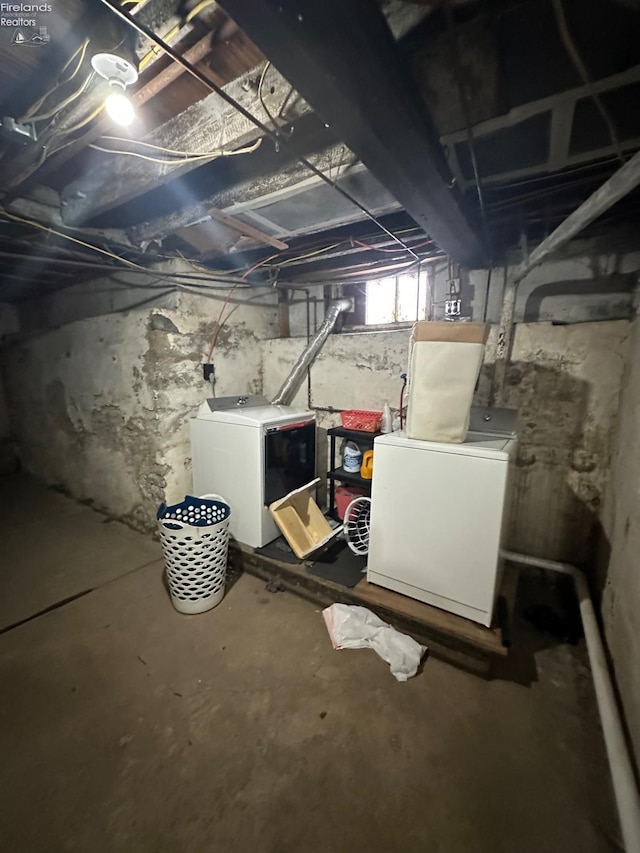 basement with separate washer and dryer