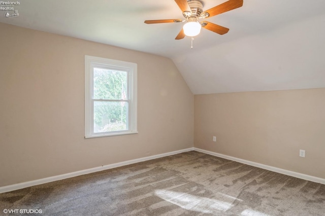 bonus room featuring carpet flooring, ceiling fan, and lofted ceiling