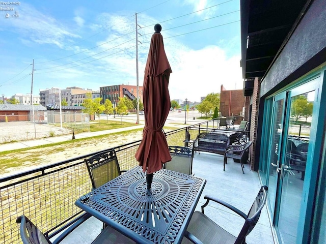 view of patio / terrace featuring a balcony