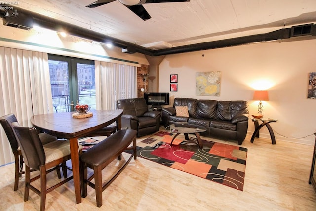 interior space featuring ceiling fan and light hardwood / wood-style flooring