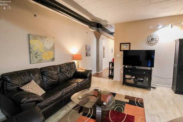 living room with hardwood / wood-style flooring