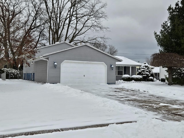 single story home with a garage