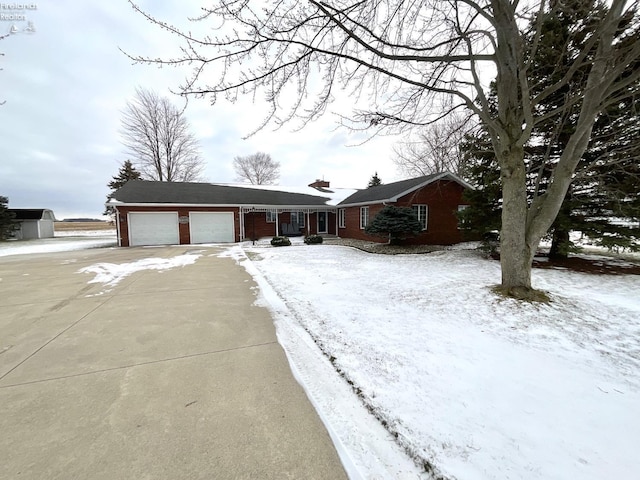 single story home with a garage