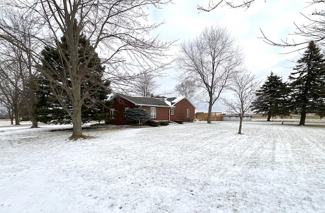 view of snowy yard