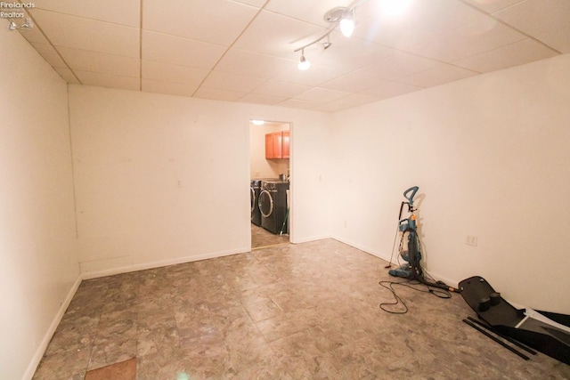 basement featuring washing machine and dryer