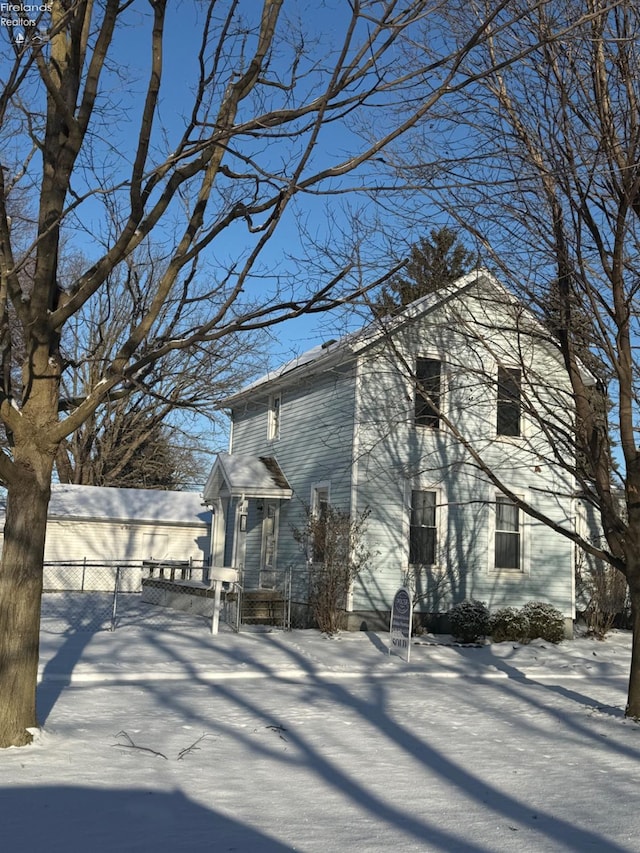 view of snow covered property