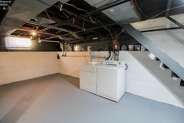 basement featuring washing machine and dryer