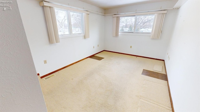 view of carpeted empty room