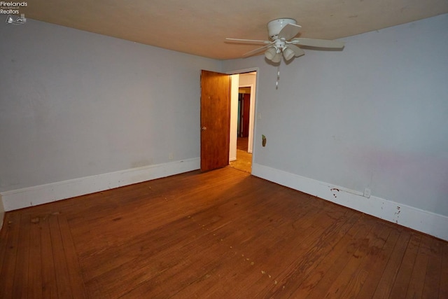 empty room featuring wood-type flooring